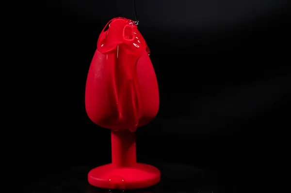 Intimate Lubricant Pours Red Anal Plug Black Background Copy Space — Stock Photo, Image